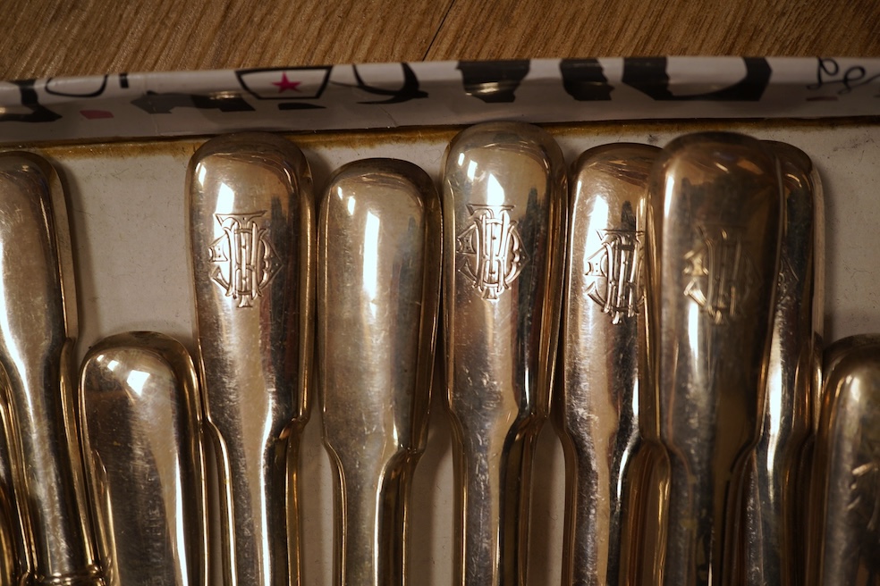 A set of nine Austro-Hungarian white metal handled table knives, 26cm. and nine matching dessert knives, all with engraved monogram and re-bladed.
